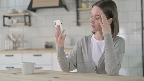Upset Young Woman Get Shock on Smartphone