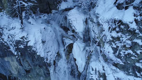 Slow Motion Detail River and Waterfall in Winter