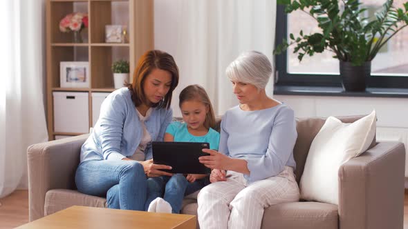 Mother, Daughter and Grandmother with Tablet Pc 5