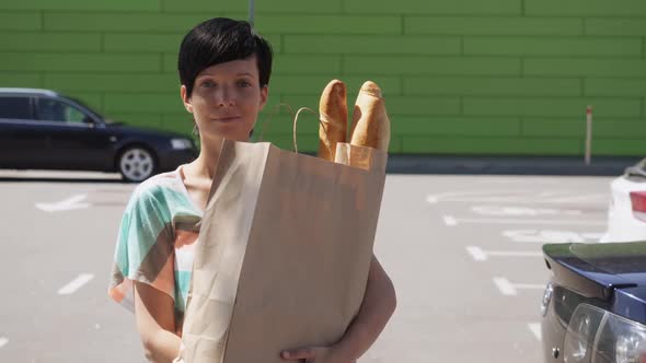 Female Posing with Groceries