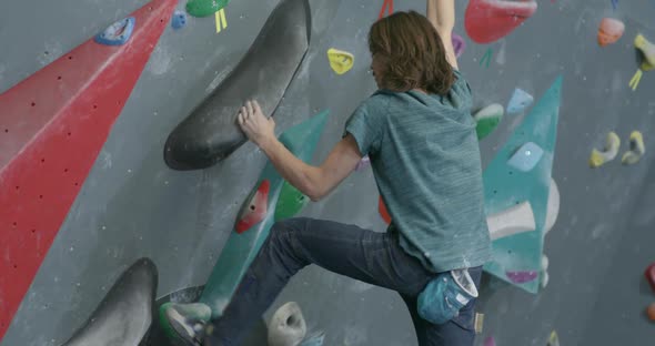 Сlimber Training on a Climbing Wall Practicing Rockclimbing Mountaineer Training Physical Activity