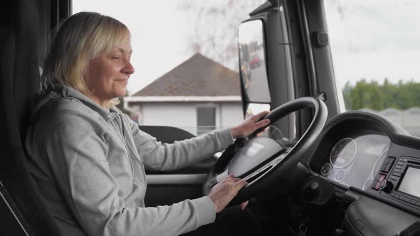 Caucasian Mid Age Woman Driving Truck