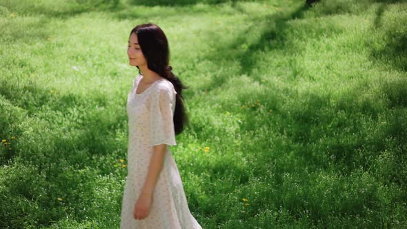 Young Girl Walking on Nature