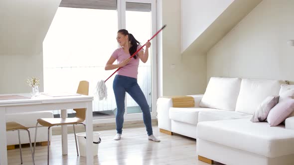 Woman or Housewife with Mop Cleaning Floor at Home 16