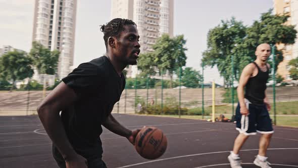 Basketball Game in the Summer on an Open Court