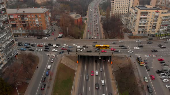 Aerial Timelapse of the Cars Passing By on a Highway and a Bridge