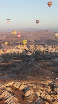 Vertical Video of Hot Air Balloons Flying in the Sky Over Cappadocia Turkey