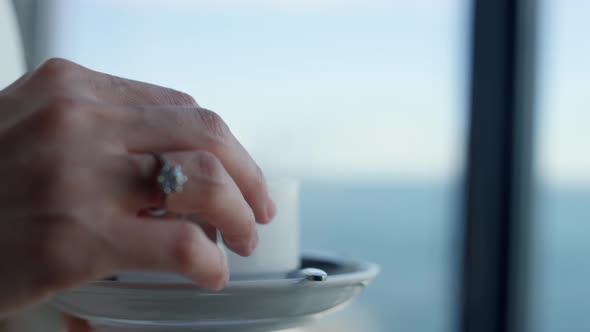 Rich Woman Hands Enjoying Coffee Cup Closeup