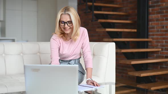 Middleages Woman Works Remotely