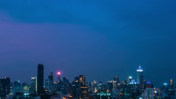 Time Lapse Night Cityscape and Highrise Buildings in Metropolis City Center