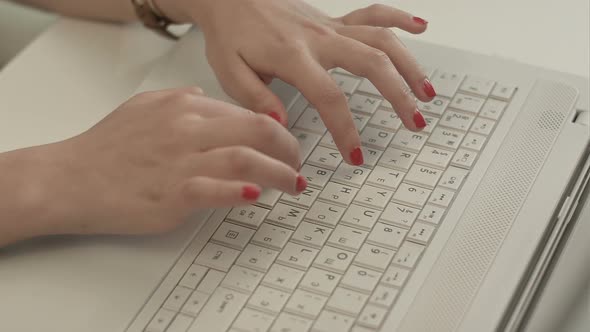 Woman Hands on the Keyboard