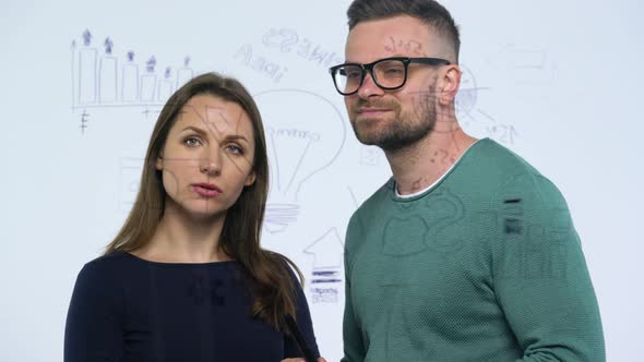 Man and Woman Shake Hands and Discuss the Business Strategy for Success in a Modern Glass Office