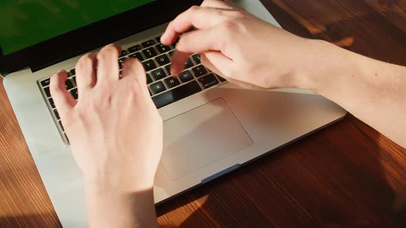 Typing on Keyboard Top View Laptop with Chroma Key Green Screen