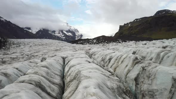 Iceland glacier extreme close up with  with drone video moving forward.