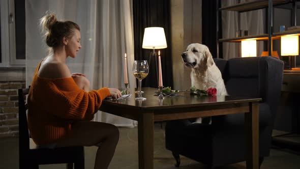 Casual Woman with Dog During Romantic Dinner