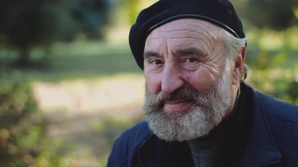 Cheerful Smiling at Camera of Wrinkled Aged Senior