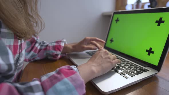 Woman Hands Typing and Scrolling on a Trackpad in a Laptop Computer Laptop Closeup