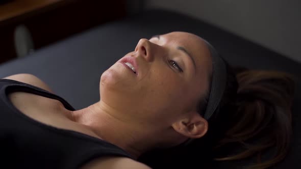 Athlete laying on physio table for examination