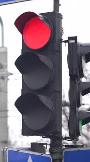 Vertical Video of a Traffic Light on the Road