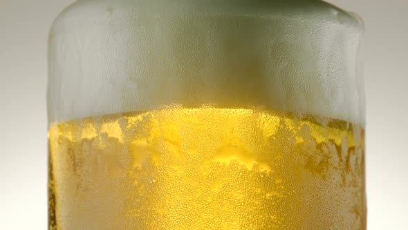 Extreme close-up beer foam and bubbles, Slow Motion