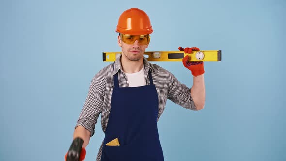 Man in Safety Wear Hard Hat Protective Goggles Gloves