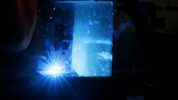 Welder welding a metal