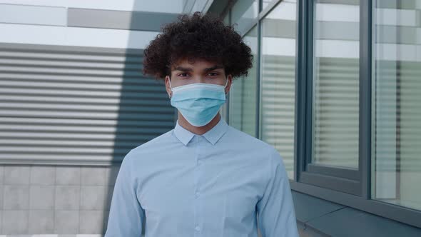 African Black Man Putting on Outbreak Mask Prevention Young Man Wearing Covid Mask
