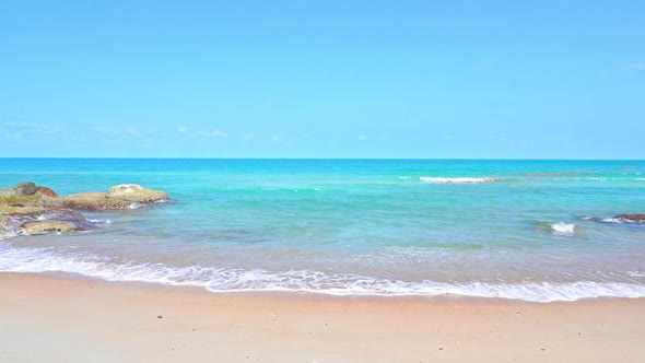 Beautiful tropical beach sea ocean with blue sky and white cloud