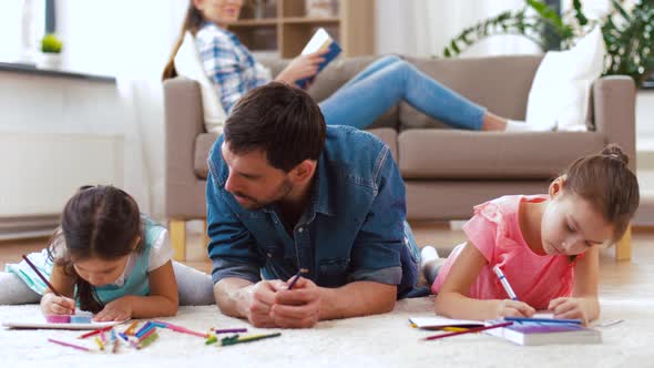 Father with Little Daughters Drawing at Home 3