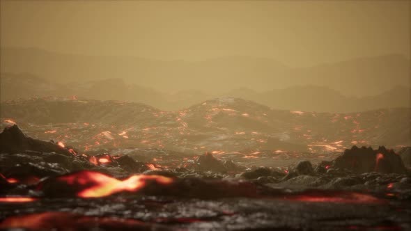 Volcanic Eruption with Fresh Hot Lava Flames and Gases Going Out From the Crater