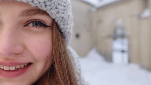 Portrait of Caucasian Pretty Happy Girl with Smile on Face Posing on Winter Citystreet Background