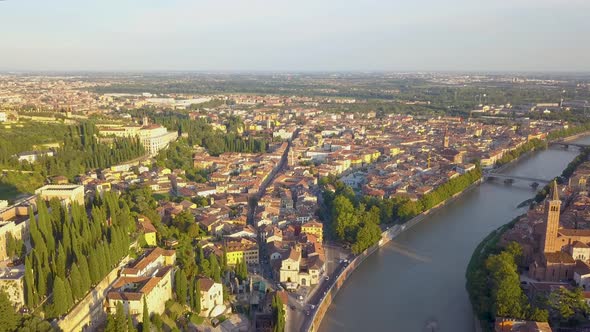 Verona Italy Skyline Aerial view from sky of historical city centre, bridges across Adige river.