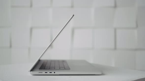 Side View of New Laptop on White Background