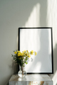 Poster frame mockup and vase with flowers. Blank photo frame with copy space - PhotoDune Item for Sale