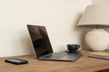 Laptop at work home place. Minimalistic comfortable home work place - PhotoDune Item for Sale