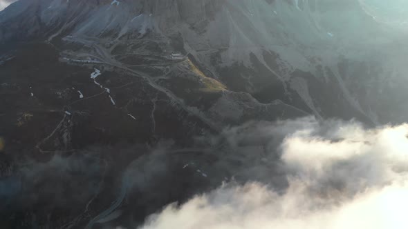 Fog Roll Over Mountain Pass Underneath Tre Cime di Lavaredo Mountain Dolomites Italy