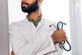 Unrecognizable male doctor In uniform and stethoscope close up - PhotoDune Item for Sale