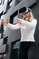 Woman Using Virtual Reality Glasses In Metaverse Business - PhotoDune Item for Sale