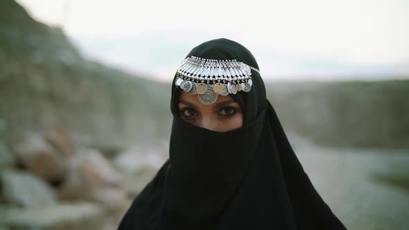 Face with Jewelry of Attractive Muslim Gir Wearing Traditional Hijab Scarf