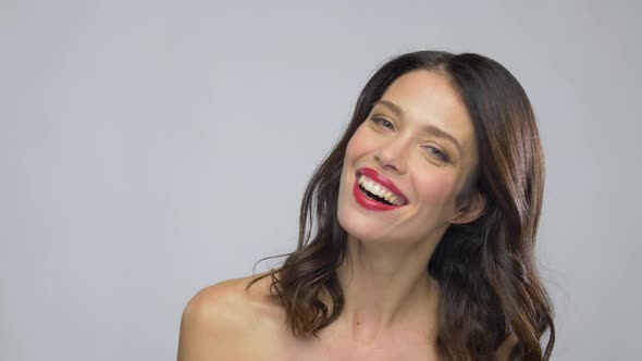 Beautiful Young Woman with Red Lipstick Laughing 11