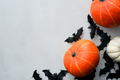 Happy Halloween flat lay background with pumpkins and bats. - PhotoDune Item for Sale