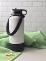 A Green Yoga Towel and a Small Pile of Vitamins on a White Counter - PhotoDune Item for Sale