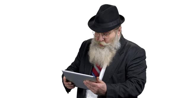 Bearded Businessman Using Digital Tablet