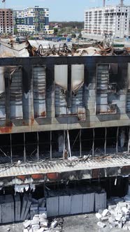 Vertical Video of a Destroyed Building of a Shopping Center in Bucha Ukraine