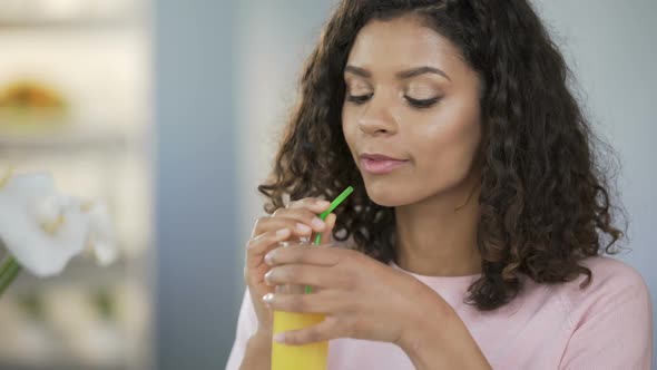 Beautiful Healthy Woman Drinking Juice and Smiling, Body Care, Rich Nutrition