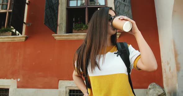 Portrait of Traveller Girl with Coffee