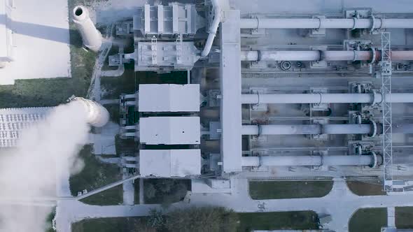 Cement Factory, Industrial Enterprise. The Smoking Factory Chimney.