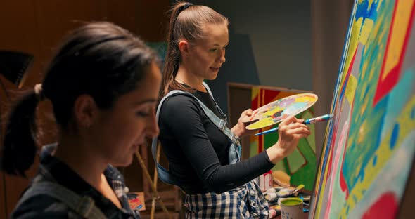 Friends Play in the Painting Studio Together Spending Time Creating a Masterpiece with Acrylic