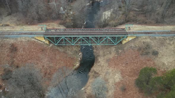 AERIAL: Rail Road Bridge Constructed Over River in Lithuania