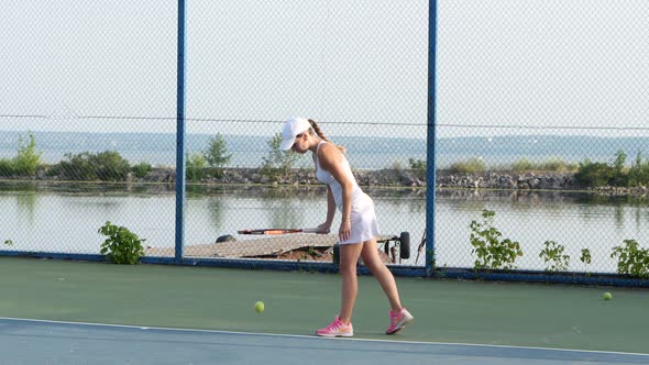 Girl Tennis Player Expecting the Tennis Ball